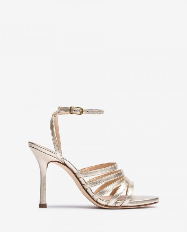 Sandales Unisa à lanières et talons hauts pour femme - Doré Sandales Unisa à lanières et talons hauts pour femme - Doré