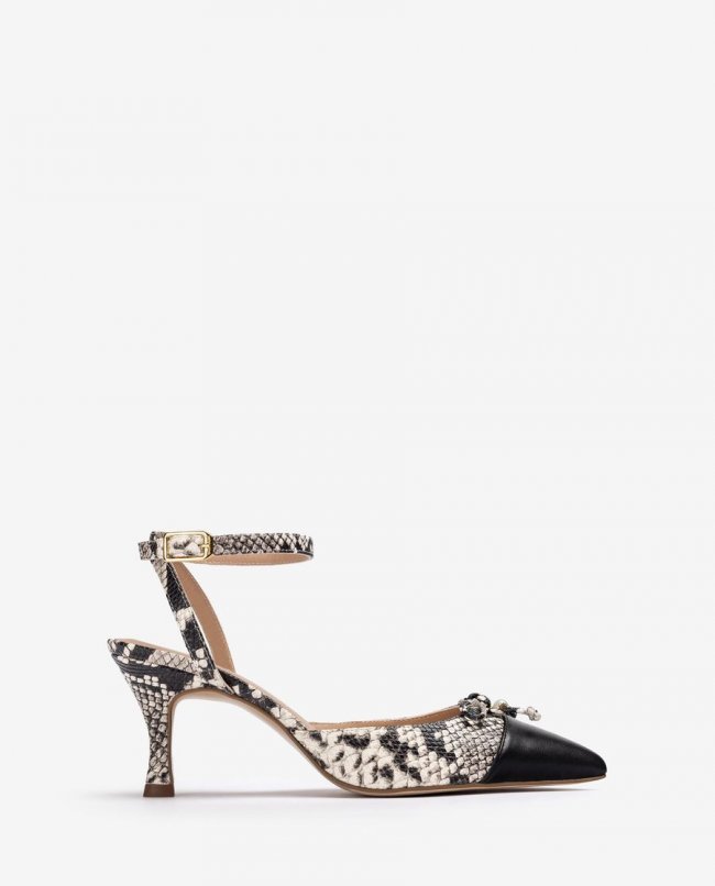 Escarpins à bride arrière bicolores Unisa pour femme avec talon orné - Ivoire / Noir Escarpins à bride arrière bicolores Unisa pour femme avec talon orné - Ivoire / Noir