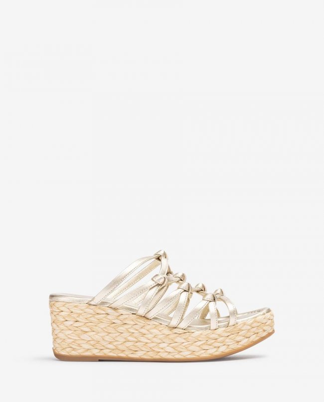 Sandales Unisa en raphia naturel avec nœuds - Doré Sandales Unisa en raphia naturel avec nœuds - Doré