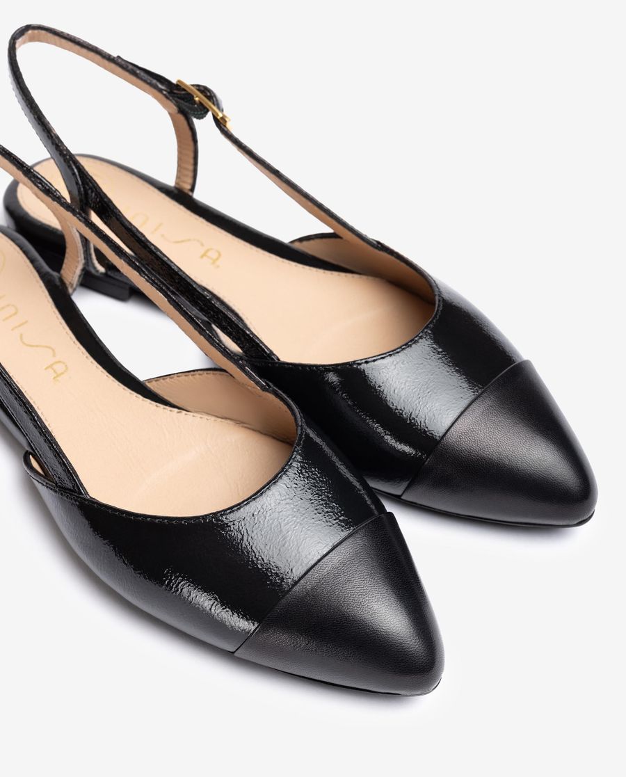 Sandales plates bicolores à bride arrière Unisa pour femme - Noir